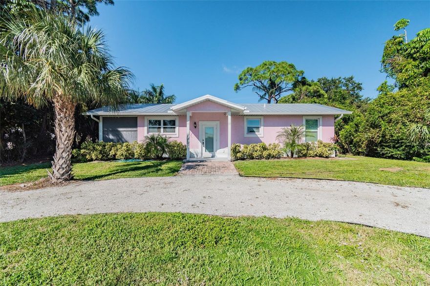 Welcome to your coastal dream retreat — a stunning 2018-built concrete block bungalow located less than 5 miles from the world-renowned Anna Maria Island! Nestled in one of Bradenton’s most desirable pockets, this 2-bedroom, 1-bath home is the perfect blend of beachy elegance and modern comfort. From the gleaming wood-look porcelain tile floors to the impact-rated windows and upgraded metal roof, every inch of this home was built to impress. The open-concept kitchen and living area flow beautifully, highlighted by quartz countertops, a 10-ft island with seating for six, Samsung stainless appliances (including a gas range and oven), soft-close shaker cabinets, and crown molding. Whether you're relaxing in the sun-drenched great room or enjoying morning coffee in the screened-in lanai, this space was made for laid-back Florida living. The spacious bedrooms are tucked away for privacy, and the luxurious spa-style bathroom features a walk-in shower with custom niche and tile detailing. Step outside to a fully fenced backyard on an oversized lot—perfect for a future pool, fire pit, or outdoor kitchen. Use it as your personal escape or continue operating it as a successful short-term rental (financials available). Offered fully furnished for $5K — just bring your suitcase! Located just minutes from Holmes Beach, Historic Bridge Street, Palma Sola Causeway, sunset boat tours, dolphin sightings, and top dining in Bradenton, Sarasota, and St. Pete. This is the Florida lifestyle you’ve been waiting for — turnkey, luxurious, and near everything. Don't miss your chance to own a slice of paradise!
