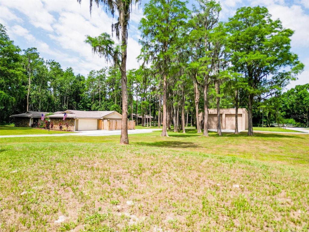 Photo of 1025 Reading Rd, Lutz, FL 33558 (MLS # TB8391792)