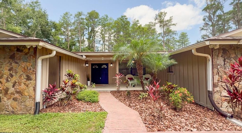 Photo of 1025 Reading Rd, Lutz, FL 33558 (MLS # TB8391792)