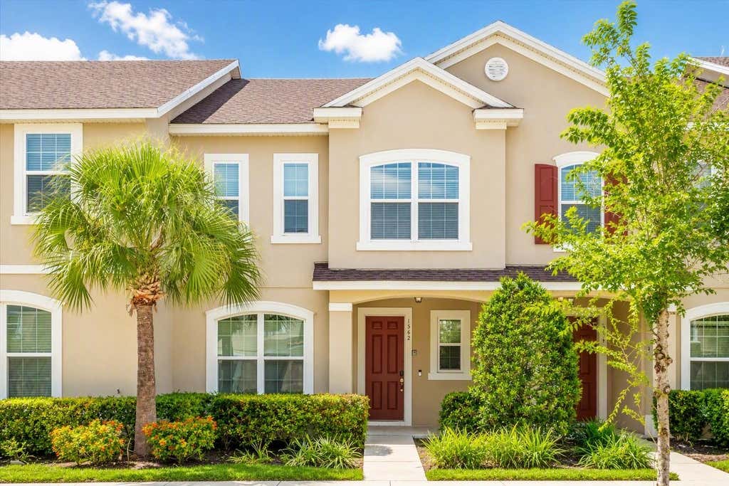 Photo of 1562 Carey Palm Circle, Kissimmee, FL 34747 (MLS # O6427089)