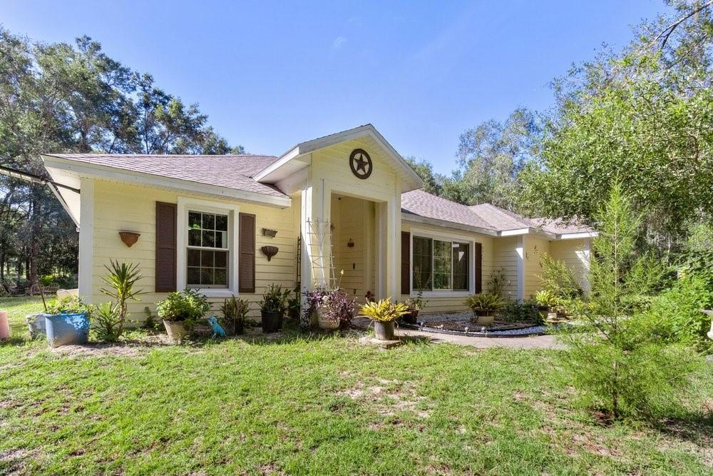 Photo of 8708 E Galatia Lane, Floral City, FL 34436 (MLS # TB8554634)