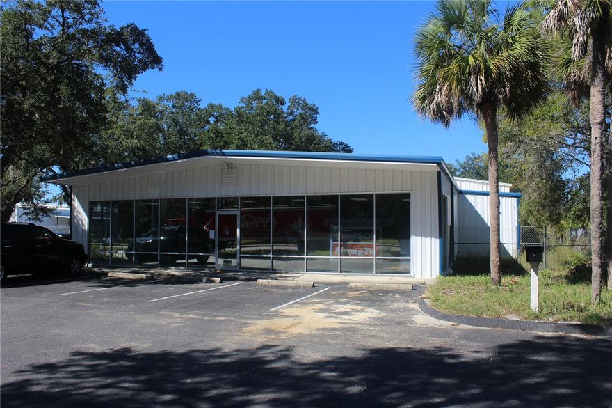 This ±9,850 SF flex warehouse at 2826 NE Waldo Road located in the Hugh Edwards Industrial Center in Gainesville, FL features approximately 2,240 SF of air-conditioned office/showroom space, ±1,610 SF of finished storage space, and ±6,000 SF of open warehouse with two roll-up doors and 14–16 ft clear heights. Zoned Business Industrial (BI), the property allows a variety of light industrial, contractor, storage, and service uses. Additional features include two restrooms, a fenced yard for outdoor storage, on-site parking, and multiple access points for efficient circulation. Located along a major commercial corridor with proximity to NE 39th Ave, US-301, the Gainesville Regional Airport, and downtown Gainesville, the property is available for lease at $10.00/SF NNN with a 5-year term.