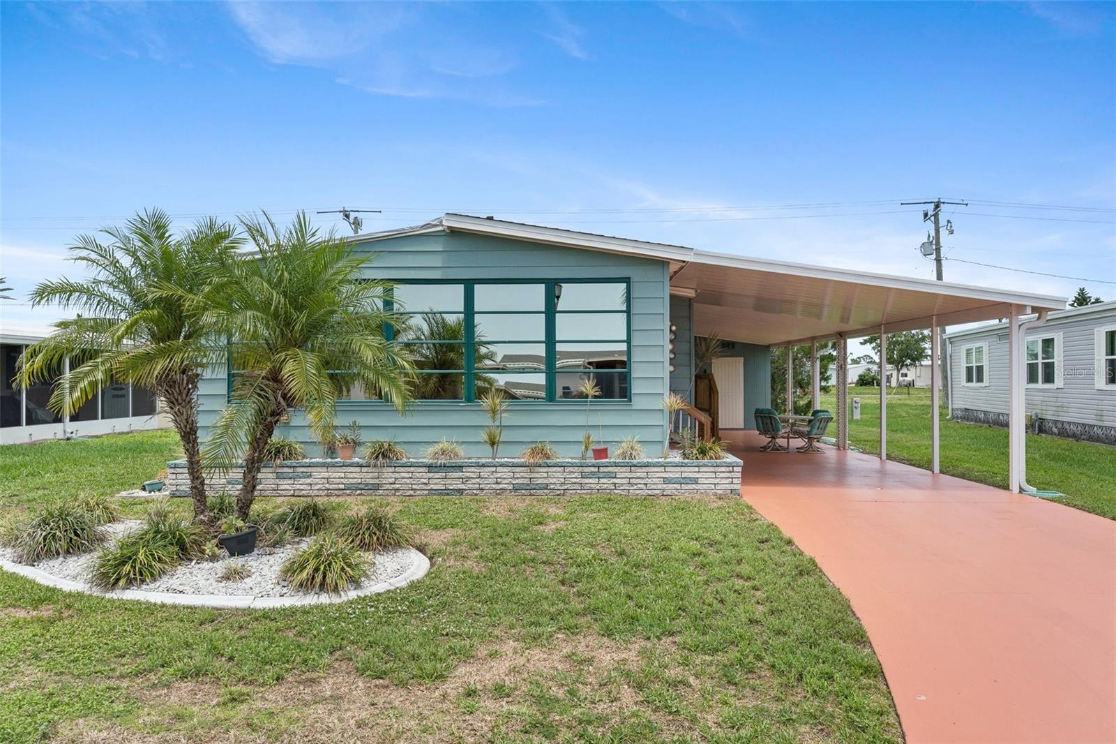 55+ active community with boat access to the Myakka River! 2 BD, 2 BA well maintained home. Enter into the kitchen/dining area through beautiful french doors that let in a lot of natural light. The dining room features a wall with built-in shelves and cabinets. Just off the dining room is the kitchen with stainless steel and black appliances, and an updated sink. Plenty of counter and cabinet space, as well as a breakfast bar area! The living room has ample space, great for enjoying your favorite tv show or movies. Open the sliding glass pocket door off the living room to the enclosed patio/lanai with a separate wall AC! Just off the living room is the 2nd bedroom with a walk-in closet. Across the hall is a 2nd bathroom with updated cabinet and sink. Continue down the hall to the primary bedroom with an en-suite bathroom! In the bedroom you'll find a built in closet, as well as a large walk-in closet and additional storage space by the ensuite bathroom. Updated cabinetry with dual bowl sinks and walk-in shower. Laundry is located in the oversized shed, where you'll find ample shelving and a workbench. Updates include: House Roof Jan 2023, HVAC Apr 2015. *$4,000 Seller Concession toward repair of enclosed lanai roof hurricane dmg.
Enjoy the many amenities this community has to offer! Clubhouse, pool & spa, fitness center, library, boat dock, bocce ball, shuffleboard, tennis and pickleball courts! The marina includes boat slips fishing pier and a canoe/kayak launch. Direct access to the Myakka River, Peace River, Charlotte Harbor and Gulf of Mexico. Close to beaches, restaurants, grocery stores and more!!