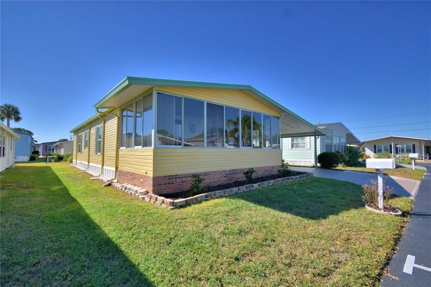 Just pack your bags and move right into this fully furnished and well maintained home.  The Seller is leaving everything you need. The front porch adds additional living area and the ceiling has been insulated for energy efficiency.  The entry doors have been replaced and a garbage disposal has been installed.  The exterior of the home has recently been painted.  The antenna is newer and allows reception of many channels without the necessity of internet.  The shingled roof is 8 years old and the air conditioner is approximately 10 years old.  The golf cart is negotiable.  Oakwood Estates, a 55+ community, offers many amenities and opportunities.  You can stay as busy as you would like, or just sit back and enjoy the peaceful community.