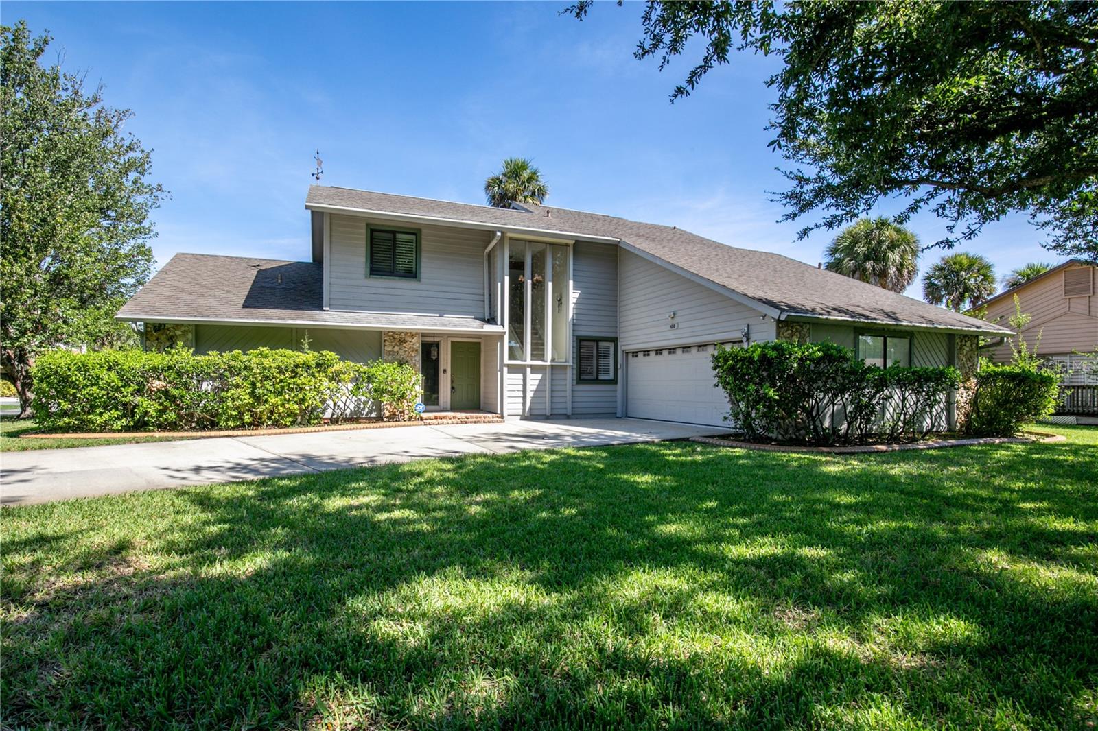 Check out this beautiful home located in the coveted community of Pelican Bay in Daytona Beach! Exceeding 3,000 sqft and situated on just under half an acre corner lot, this home welcomes any lifestyle. When walking into the home, you are greeted with an abundance of natural light, cathedral ceilings, and a double-sided fireplace. With air conditioning offered in the garage, one is now given extra square footage for a home gym or hobby area! Venturing into the community, Pelican Bay amenities include an 18-hole golf course, tennis, and pickleball courts. Not to mention approximately 20 minutes from Daytona Beaches and 15 minutes to Daytona's international airport and Speedway! To sweeten this deal, seller will put on a new roof at closing! Schedule a private showing to see all that this home has to offer you!