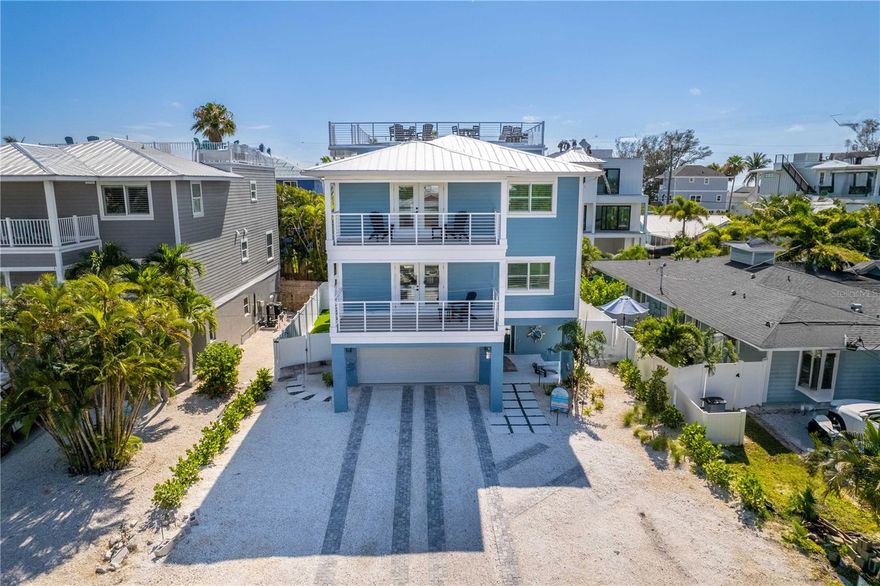 HUGE $495K PRICE REDUCTION  CURRENTLY $200K IN RENTALS ON THE BOOKS FOR 2025 

Introducing "Endless Summer"—your perfect vacation retreat and investment opportunity! This newly constructed (2024) gem features 7 spacious bedrooms and 6 elegant bathrooms, just a 4-minute stroll from the beach.


Key Features:
Bedrooms: 7
Bathrooms: 6
Elevator: Easy access across all levels
Pool & Spa: Walk-in pool and spa for ultimate relaxation
EV Charger: Eco-friendly convenience
Designer Touches: Stylish accent walls throughout
Rooftop Deck: Perfect for Coastal Sunsets
Backyard Oasis: Featuring turf for putting, cornhole, and Connect Four. Enjoy the walk-in pool and spa. The garage includes a ping pong table, extra refrigerator, and ice maker.

"Endless Summer" is designed for relaxation and enjoyment, with a projected income of around $380K, making it a fantastic investment. Experience the magic of Bradenton Beach at "Endless Summer" and create lasting memories. The sales agent is a part owner of this property.