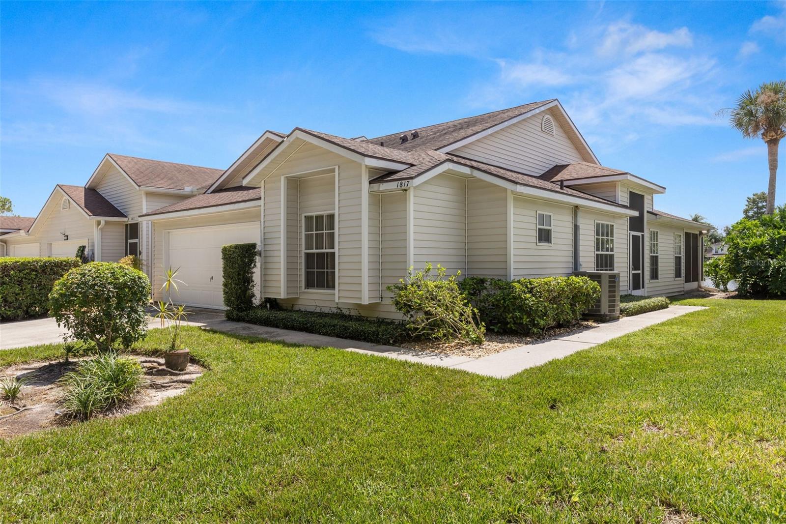 Welcome to 1817 Lake Heron Drive—a beautifully maintained 3-bedroom, 2-bathroom villa with a 2-car garage, tucked away in the quiet and desirable Lake Heron community. This end unit offers a low-maintenance lifestyle with low monthly dues, covering exterior maintenance, lawn care, and access to the community pool, tennis courts, and pickleball.
Step inside to find thoughtful upgrades throughout, including luxury vinyl plank flooring, newer stainless steel appliances, and fresh interior paint. The open-concept layout seamlessly connects the family room, kitchen, and dining area, featuring a breakfast bar and a bright eat-in kitchen space surrounded by windows. The family room is filled with natural light and opens through sliding glass doors to a screened patio with tranquil lake views—perfect for relaxing or entertaining.
The spacious primary suite includes a walk-in closet and an en-suite bath with dual sinks, a garden tub, separate shower, and ample cabinetry. The two additional bedrooms are generously sized, ideal for guests, a home office, or extra storage, and are conveniently located near the full guest bath and laundry closet.
Lake Heron offers a tranquil setting with easy access to shopping, dining, I-75, I-275, and more. This villa blends comfort, convenience, and community—perfect for those seeking a relaxed, easy-care lifestyle.