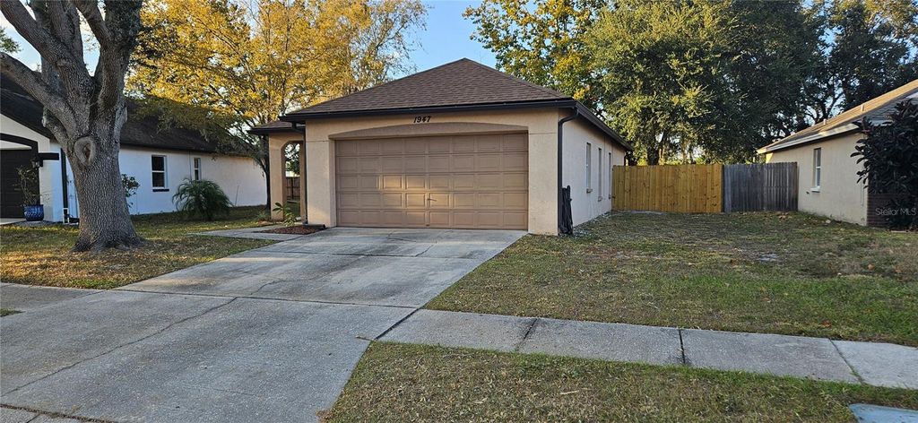 Photo of 1947 Tinker Drive, Lutz, FL 33559 (MLS # TB8445242)