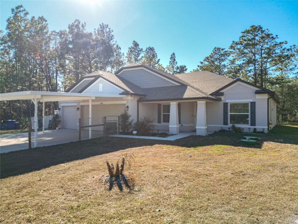 Photo of 17479 Macassar Road, Weeki Wachee, FL 34614 (MLS # TB8465815)