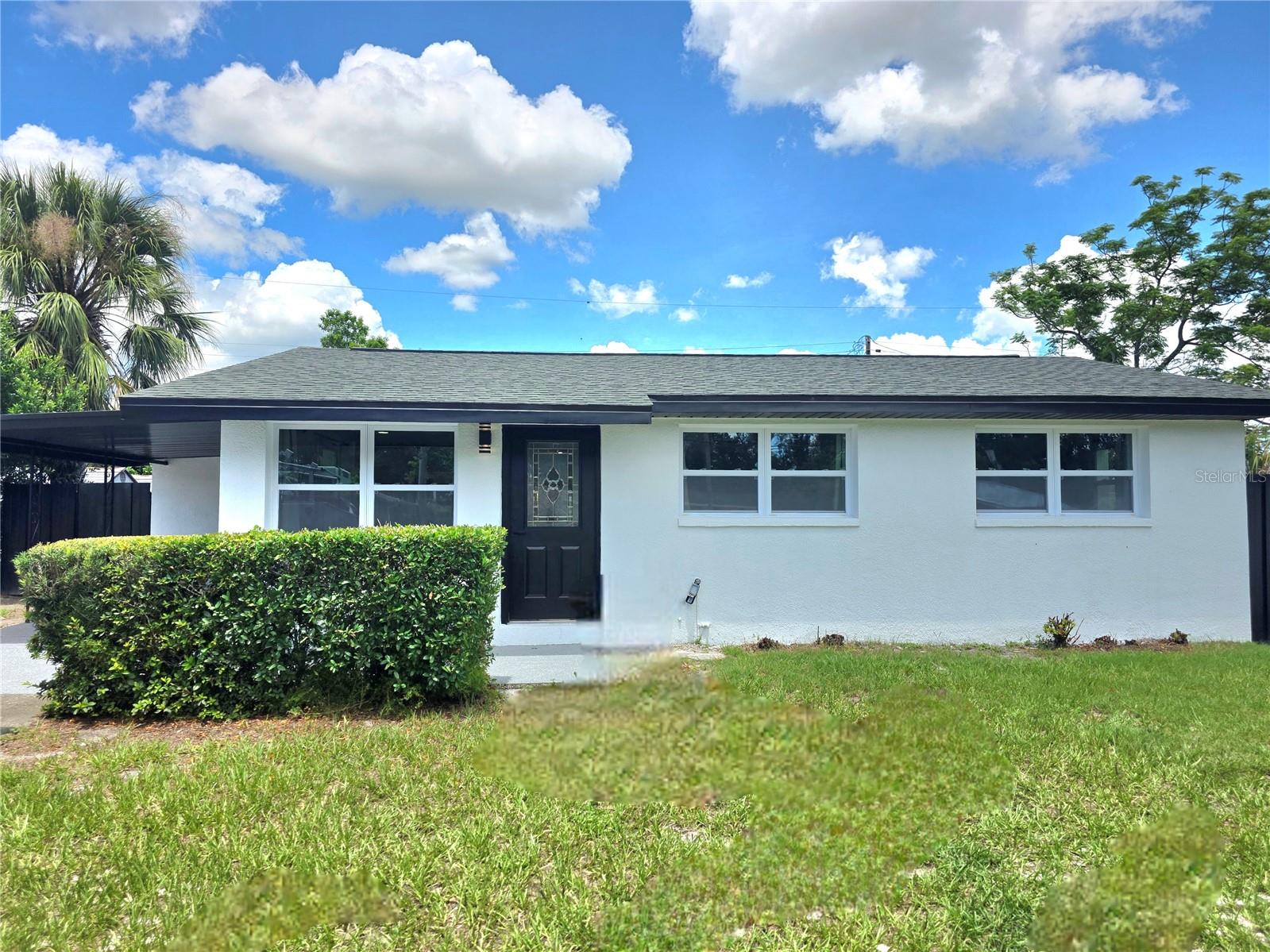 This stunning, fully updated home offers the perfect blend of modern style and everyday functionality. With gates on both sides of the property, you’ll have secure, easy access for a boat, trailer, or multiple vehicles—perfect for hobbyists, travelers, or outdoor enthusiasts.
Inside, the kitchen is a true showpiece with all-quartz waterfall countertops with seating, stainless steel appliances, and an open layout that flows seamlessly into the living and dining areas. New luxury vinyl plank flooring runs throughout, complemented by recessed lighting for a bright, welcoming feel.
Each bedroom features brand-new ceiling fan fixtures with remote controls, providing year-round comfort at the touch of a button. The two newly renovated bathrooms include upscale touches—one with a waterfall shower head for a spa-like experience and both with heated mirrors to keep your mornings fog-free.
Step outside to a screened-in porch, perfect for relaxing or entertaining without pests, and enjoy the convenience of a coveted carport plus ample driveway parking for guests.
Move-in ready and thoughtfully upgraded, this home is designed for both style and function—offering you the comfort you deserve and the space you need.