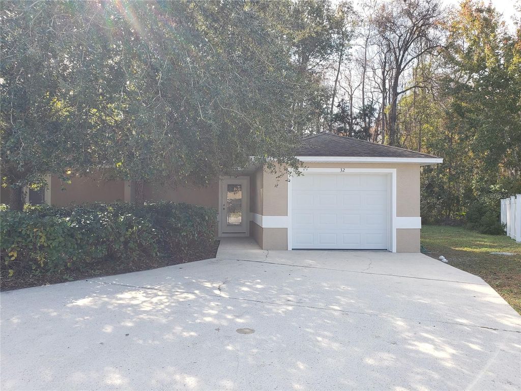 Photo of 32 Zoeller Ct #B, Palm Coast, FL 32164 (MLS # FC317161)