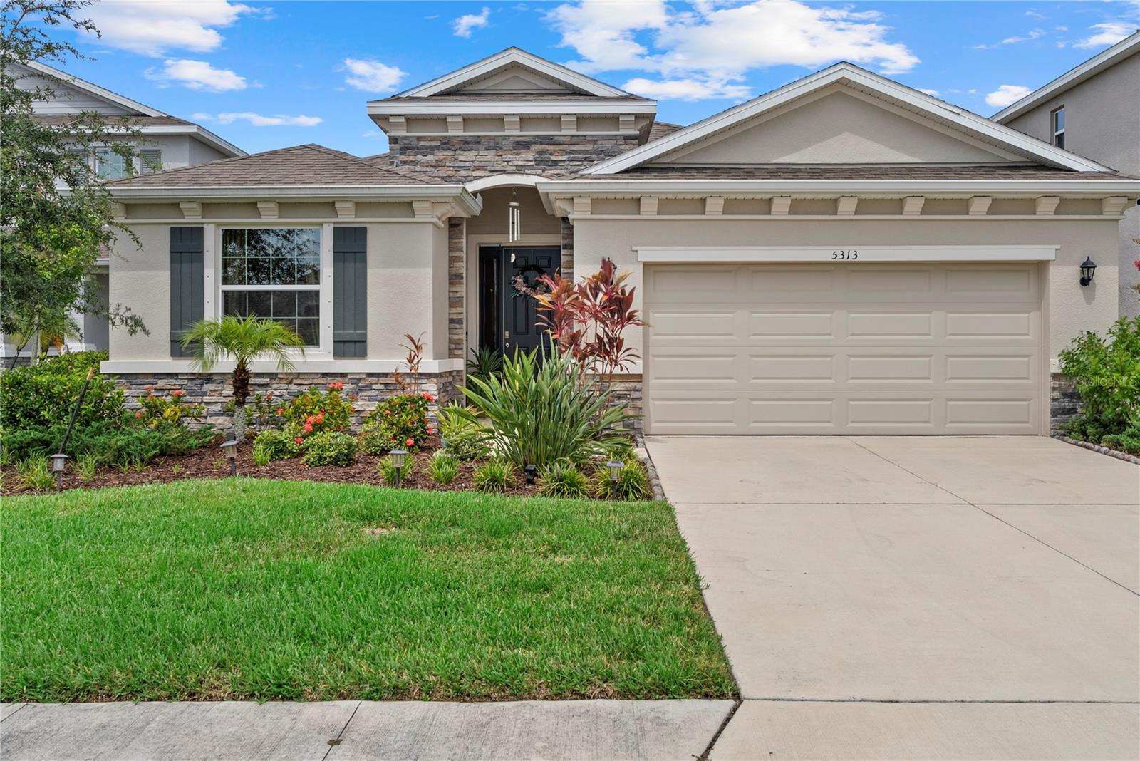 Welcome to exceptional lakefront residence showcasing thoughtful upgrades, designer finishes, and a prime cul-de-sac location within the highly desirable Lakewood Ranch community.
This meticulously maintained home offers a spacious, open-concept layout with extended tile flooring throughout the master bedroom, closets and bonus room — ensuring a clean, modern look. The interior is freshly painted in neutral tones, creating an inviting, move-in-ready atmosphere.
The gourmet kitchen is a chef’s delight, featuring upgraded appliances and a fully tiled kitchen island with matching tile for a cohesive, upscale feel. Stylish light fixtures add warmth and character throughout the main living areas.
Both bathrooms have been tastefully upgraded, including a converted guest bath with a walk-in shower and a fully tiled master shower with a polished tub.
Additional features include laminated garage floors for a clean, finished appearance and an alarm/camera system for added peace of mind. Step outside to the screened-in lanai with a panoramic-style cage that maximizes the stunning lake views. The lanai is further enhanced with outdoor fans and lighting — perfect for year-round entertaining.
The property’s improved landscaping, full gutter system, and expansive backyard offer an ideal setting to design your dream pool and outdoor oasis.
Located close to Lakewood Ranch’s top-rated schools, shopping, dining, golf, and parks, this residence combines privacy and convenience with a true Florida lifestyle.
Do not miss the opportunity to own this beautifully upgraded, lakefront home with remarkable attention to detail. Schedule your private tour today and experience elevated living in one of Florida’s premier master-planned communities.