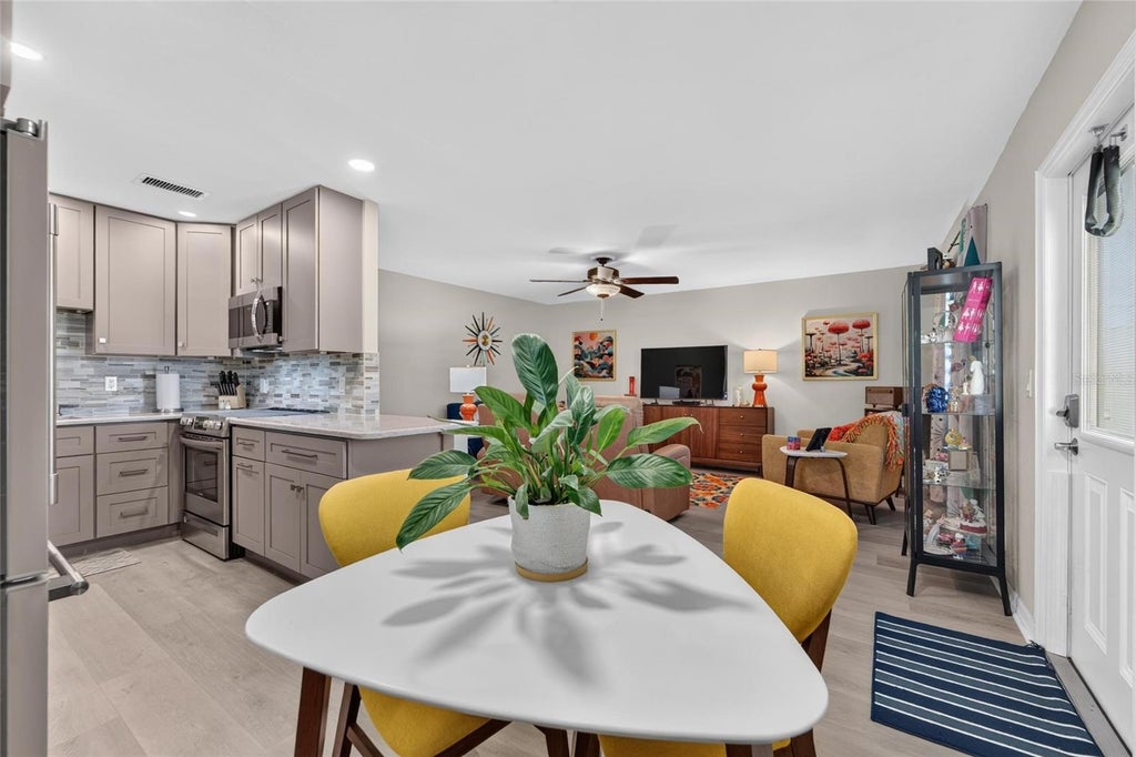 Photo of 102 Cambridge Trail #220, Sun City Center, FL 33573 (MLS # TB8548927)