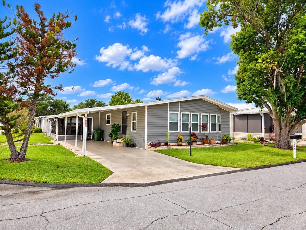 Photo of 6685 NE Briarhill Drive NE, Winter Haven, FL 33881 (MLS # P4940184)