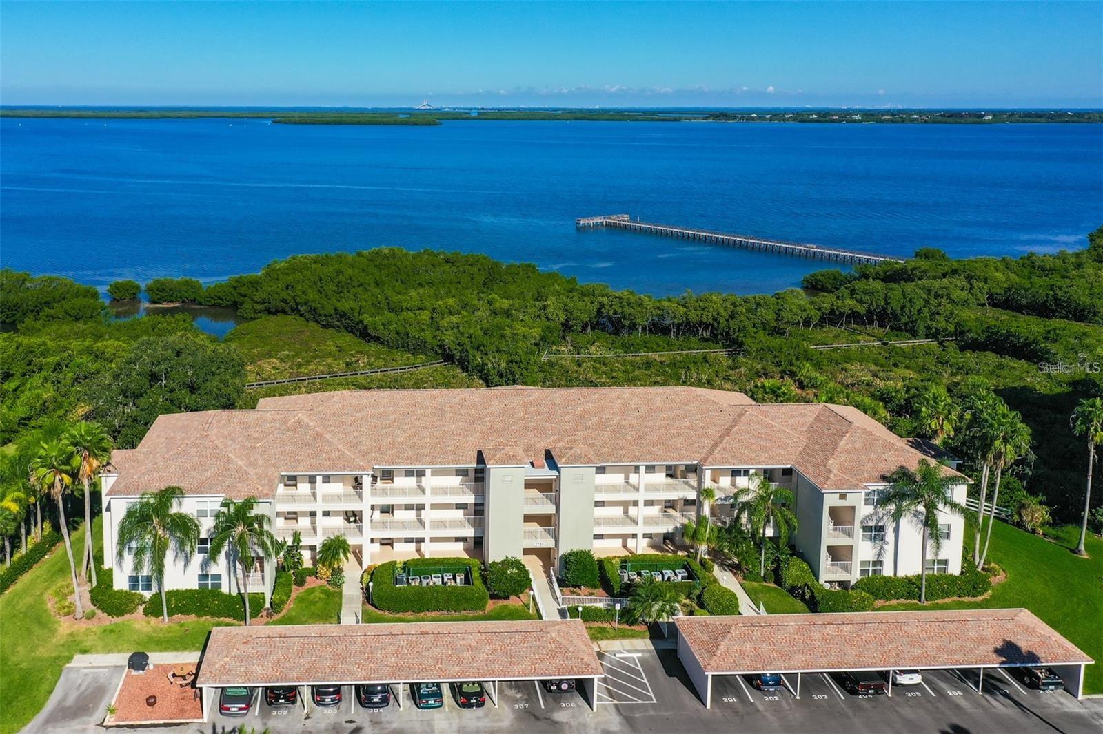 THE ESTUARIES at TERRA CEIA GULF AND BAY CLUB. New to the rental market is this absolutely fabulous 1 bedroom 2 bathroom second floor condo overlooking Terra Ceia Bay from the screened in lanai. This condo features an eat in kitchen, open floor plan with a living room and dining area combination and the second bedroom has been turned into an office/ den/ reading room. You will love the Western exposure of this condo and your views of beautiful sunsets sunsets over the bay. Terra Ceia Bay Club is conveniently located within minutes to downtown Palmetto and the waterfront district and just over the Green Bridge and the Manatee River to Bradenton`s River Walk area. Terra Ceia is conveniently located to the I-75 and I-275 interstate exchange access to travel to St. Petersburg, Tampa or Sarasota. This condo is perfect for transitional housing and available as a seasonal or off season rental. There is a satellite community pool across the street for your enjoyment. Terra Ceia Gulf and Bay Club also has exceptional amenities such as an on site restaurant, pro shop and golfing, fitness center, tennis and pickleball courts, fishing pier and wonderful sidewalks to enjoy an evening walk. (Utilities are included with a $100 cap on the electric).