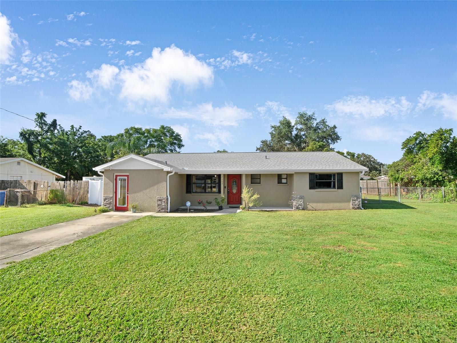 One or more photo(s) has been virtually staged. This home is a needle in a haystack home! A Rare Income-Generating Home with a Business Flexibility on Nearly ½ Acre. A beautifully maintained 3-bedroom, 2.5-bath home offering 1,711 sq ft of updated living space, a private business-ready suite, and nearly half an acre of land in a prime location, Valrico Florida. This home presents a unique opportunity to live comfortably while running a business or generating rental income, all under one roof. Enter the home into the great room with all ceramic tile flooring. The back of the home features a Florida room with vaulted ceiling and lots of windows for natural lighting. Behind the Florida room is a screened in patio. The kitchen has been remodeled with granite countertops and light cream JSI cabinets with rope crown molding and tile backsplash. Soft-close drawers and doors, Lazy Susan, pull out pantry drawers. Access from kitchen to in-law suite/business suite. The hall bathroom has a tub/shower combo with listello accent tiles and updated vanity with wood framed mirror and nickel vanity light. The master bathroom has a cermic tile walk in shower and wood vanity with wood framed mirror and nickel vanity light. The three bedrooms feature the same ceramic tile flooring as the rest of the home. The fenced backyard is large enough for a swimming pool and playground. Bring your toys to store in the backyard. Additional features-Ceiling Fans, New roof, Upgraded electrical panel, Fresh interior and exterior paint, New stove and refrigerator, Tankless water heater, New closet doors and interior doors throughout the home, New hood range, APEC reverse osmosis water system,Exterior water softener and water purifier, 8x10 chicken enclosure and hutch built this year and separate coop, Young fruit trees planted in 2022–2023: loquat, lemon, calamansi, banana, and Barbados cherry. A 15-year-old rosemary bush and a graceful palm tree in the front yard add curb appeal and charm
*Professionally Built Business Suite*
Perfect for personal service professionals or potential rental income!
Features include:
True tankless water heater
Updated electrical panel
Mitsubishi split A/C unit
ADA-compliant bathroom
Washer/dryer
Storage room & additional sink
Private entrance with hurricane-impact door and window
Full salon setup: Brio 11 hooded dryer, shampoo station, styling chair, mirror, product shelves, hair vacuum, back-bar cart, waiting area with seating