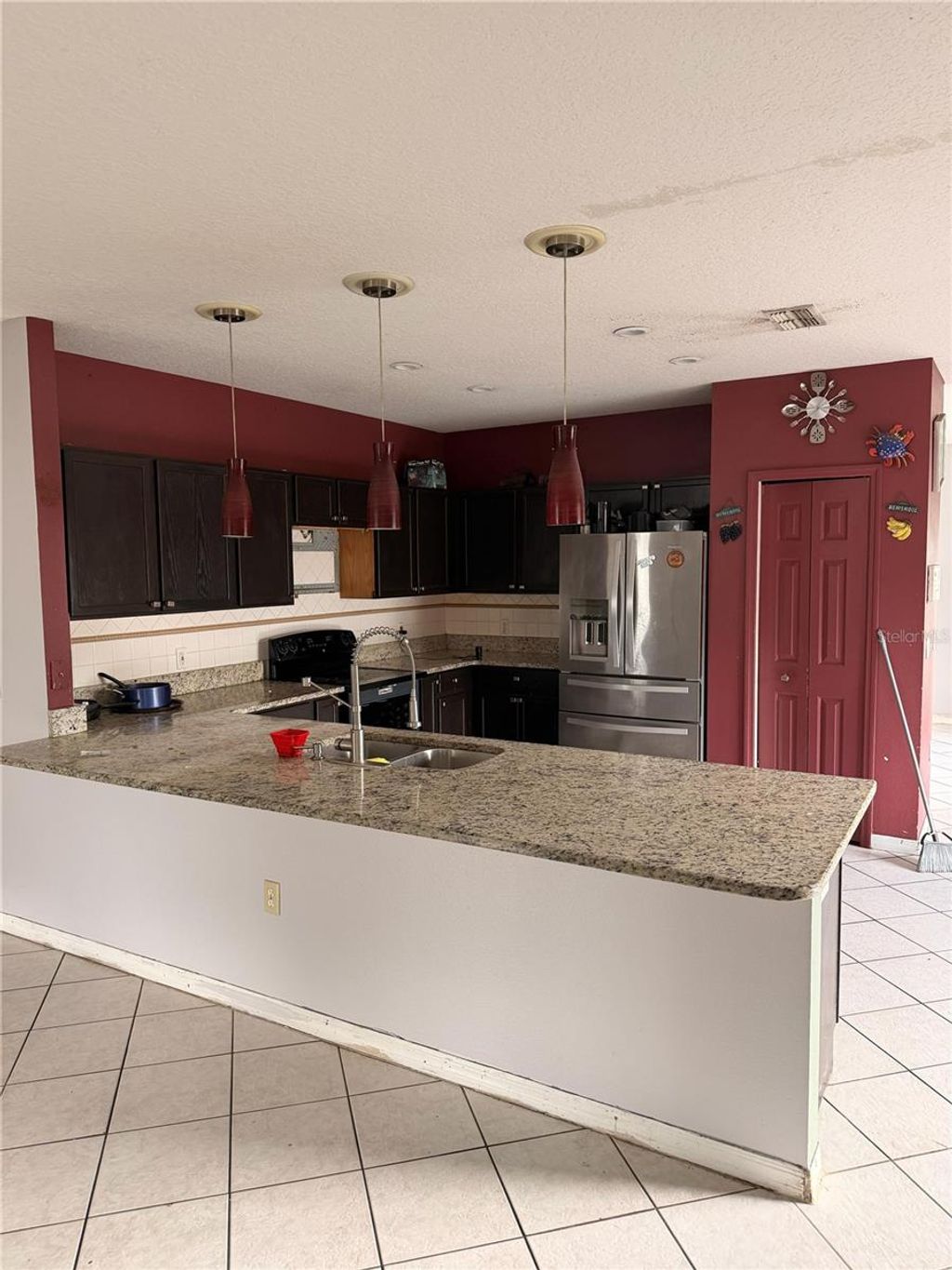 Photo of 207 Redwood Bark Trail, Kissimmee, FL 34758 (MLS # O6364507)