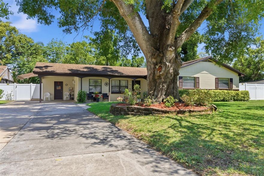 Welcome to 2521 Krueger Lane in Tampa—a rare opportunity to own a meticulously maintained 3-bedroom, 2-bath home with 1,776 square feet of living space on a sprawling 1/3-acre lot. Proudly owned and cared for by the same family for over 50 years, this home exudes pride of ownership and offers the perfect blend of timeless charm and modern updates.

From the moment you arrive, the curb appeal stands out, complemented by a full irrigation system and a beautifully sized yard that sets the stage for true Florida living. Step inside to an inviting open floor plan that flows seamlessly, creating a bright and welcoming space ideal for both everyday living and entertaining. The living room is anchored by a cozy wood-burning fireplace, adding warmth and character, while the updated kitchen shines with sleek Corian countertops and ample space to cook, host, and gather.

Throughout the home, new luxury vinyl flooring enhances both style and durability, giving the entire space a fresh, modern feel. Just beyond the main living area, a newer screened-in patio offers the perfect place to unwind or entertain while overlooking the expansive backyard—ready for a pool, garden, or your own private outdoor retreat.

One of the true highlights of this property is the impressive 20x20 detached garage/workshop—a dream setup for hobbyists, car enthusiasts, or anyone needing serious storage or workspace. In addition, the oversized lot provides ample room for RV and boat parking, a rare and highly sought-after feature.

Homes like this—offering space, flexibility, and long-term care in a desirable Tampa location—don’t come around often. Whether you're looking for room to grow, space for your toys, or simply a property with character and potential, this one checks all the boxes. Don’t miss your chance to make it yours.