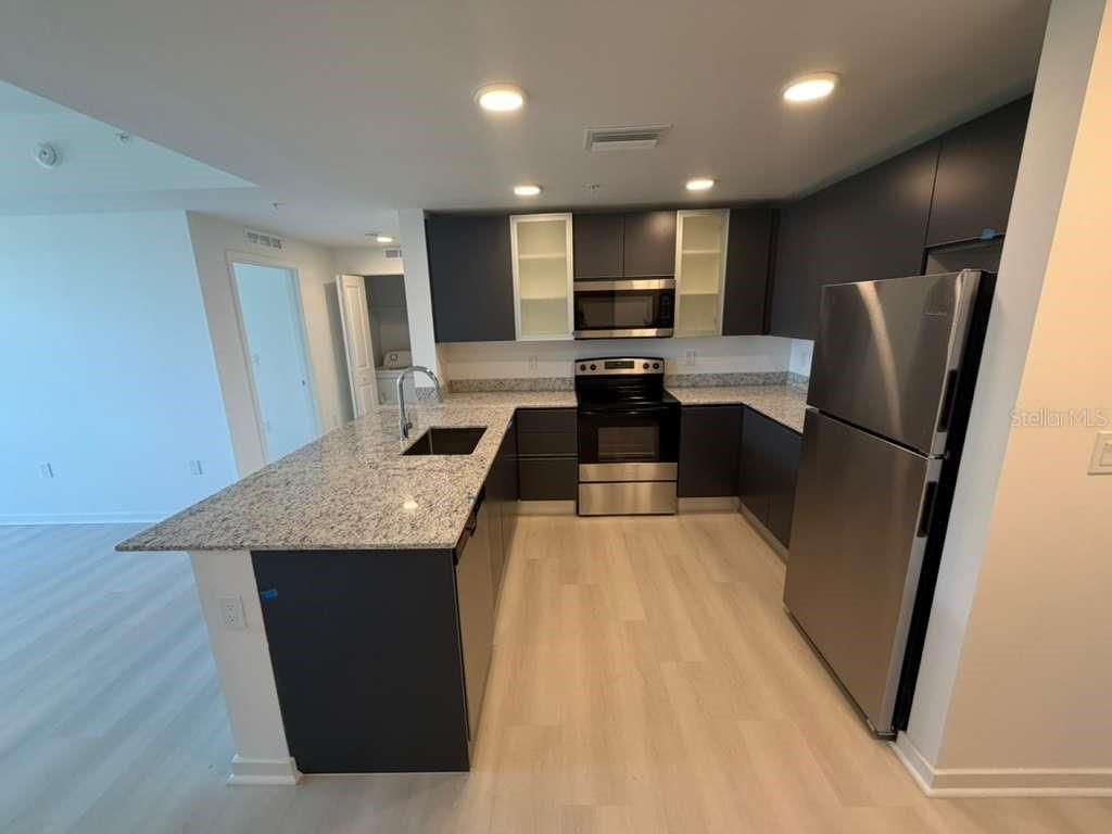 Photo of 5587 Millenia Park Boulevard #209, Orlando, FL 32839 (MLS # O6386759)