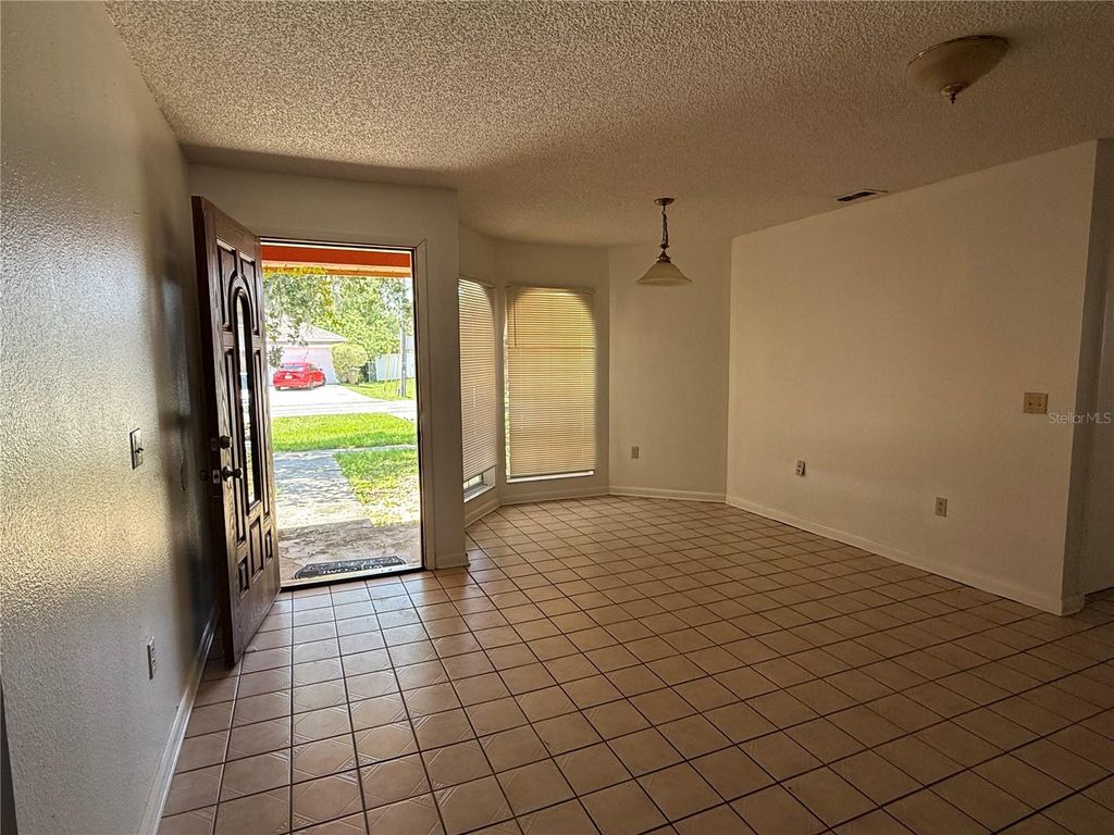 Photo of 925 Derbyshire Drive, Kissimmee, FL 34758 (MLS # S5128663)