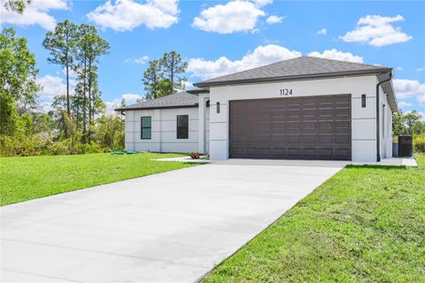Photo of 1124 S Edelweiss Street E, Lehigh Acres, FL 33974 (MLS # C7524554)