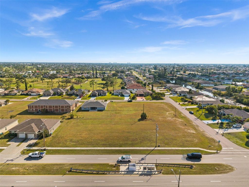 Photo of 1418 SW Trafalgar Parkway, Cape Coral, FL 33991 (MLS # C7518156)