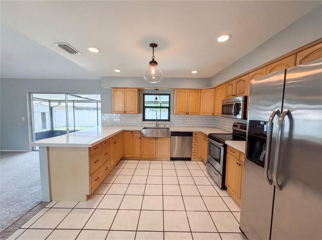 Photo of 17621 Meadowbridge Drive, Lutz, FL 33549 (MLS # O6399782)