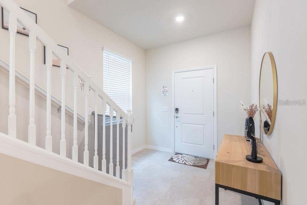 Photo of 7215 Oakmoss Loop, Davenport, FL 33837 (MLS # O6414326)