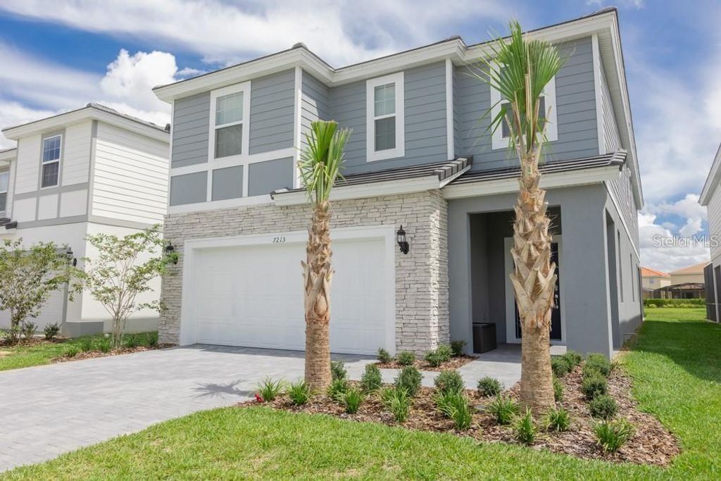 Photo of 7215 Oakmoss Loop, Davenport, FL 33837 (MLS # O6414326)