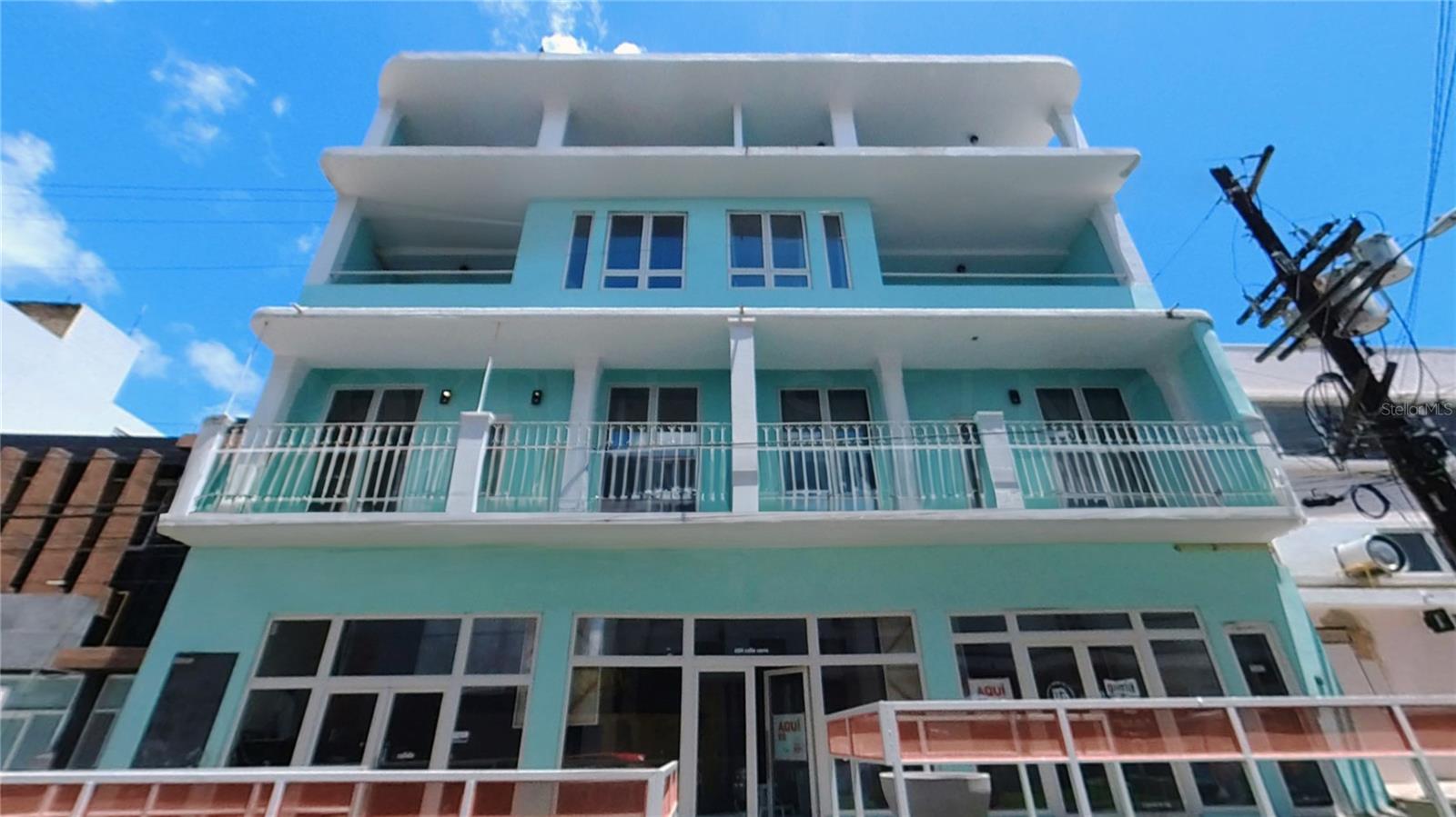 This exceptional mixed-use property is in the heart of the vibrant Miramar district, home to many trendy dining establishments. The area is being revitalized, with numerous old apartments being transformed into chic, modern living spaces, making it a prime location for investment. The building is conveniently located close to all amenities and is currently utilized as a short-term rental unit, boasting a remarkable occupancy rate and profitability.
This property offers seven units: one retail space, five three-bedroom, two-bathroom apartments, and one two-bedroom, two-bathroom apartment. With a sprawling total area of approximately 12,000 square feet, the building is fully furnished with all appliances. Additionally, seller financing options are available, making this an enticing opportunity for prospective buyers.