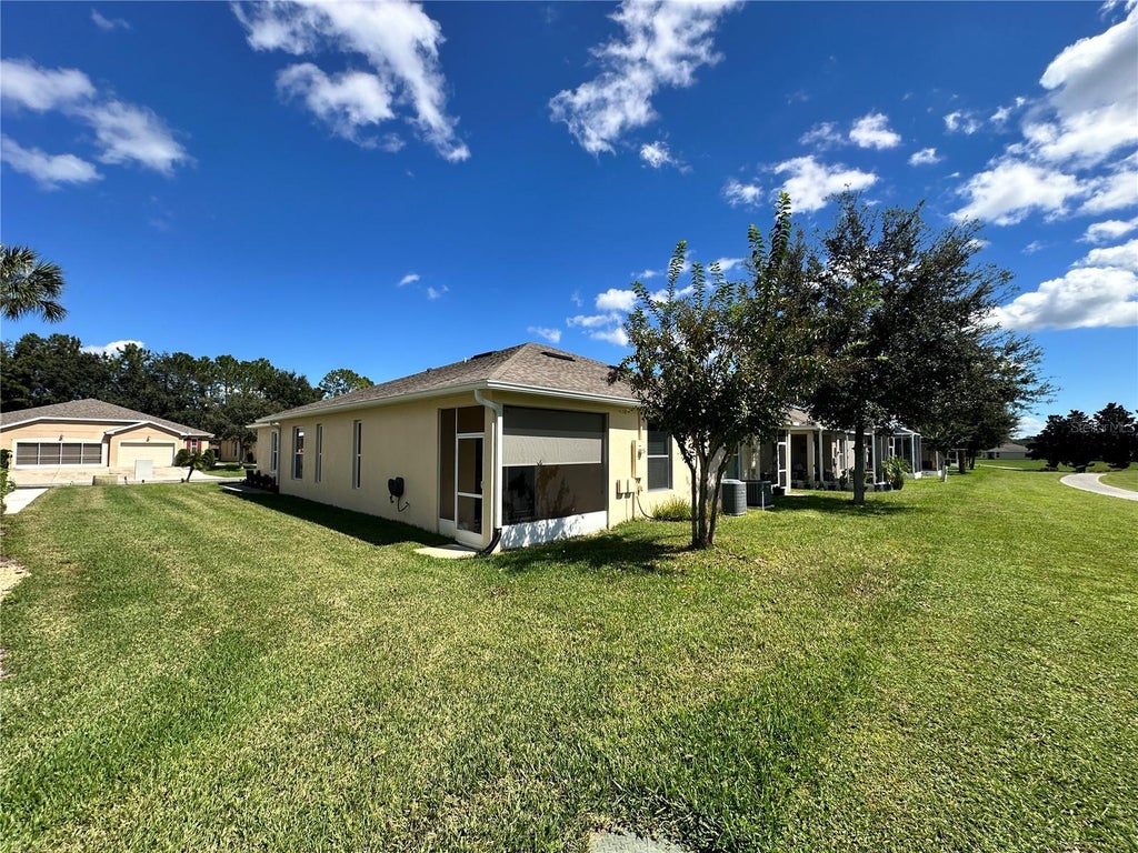 Photo of 26942 White Plains Way, Leesburg, FL 34748 (MLS # O6447598)