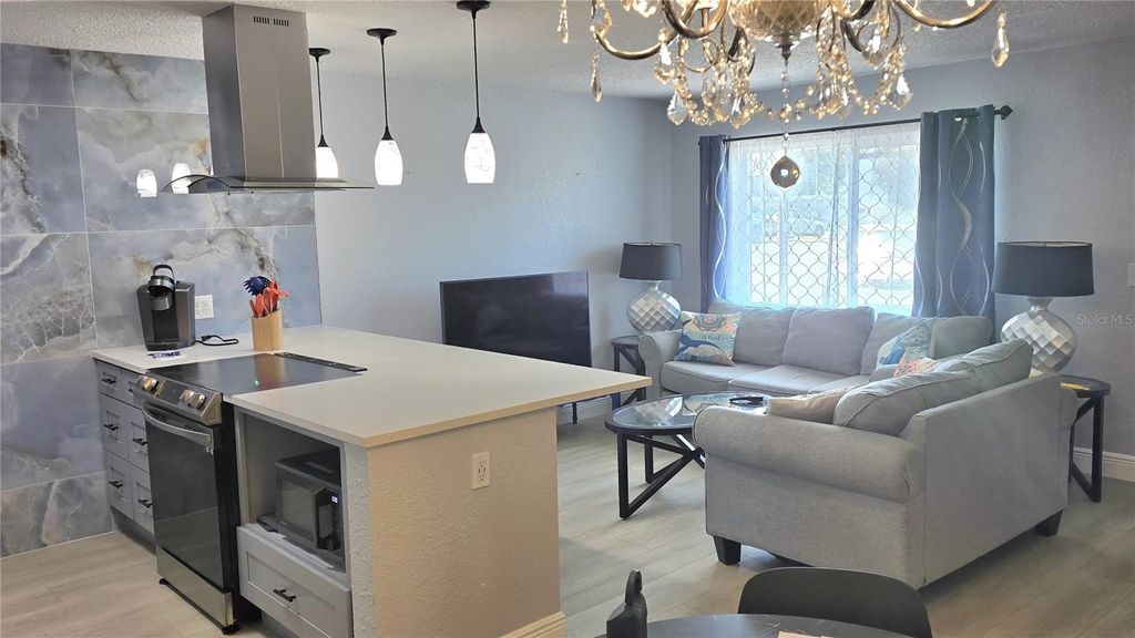 Photo of 9213 Tudor Drive #103 B, Tampa, FL 33615 (MLS # TB8425232)