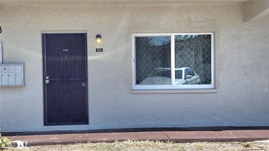 Photo of 9213 Tudor Drive #103 B, Tampa, FL 33615 (MLS # TB8425232)