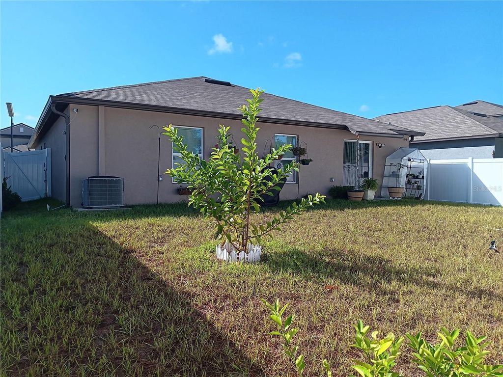 Photo of 253 Rain Lily Avenue, Spring Hill, FL 34609 (MLS # TB8439857)