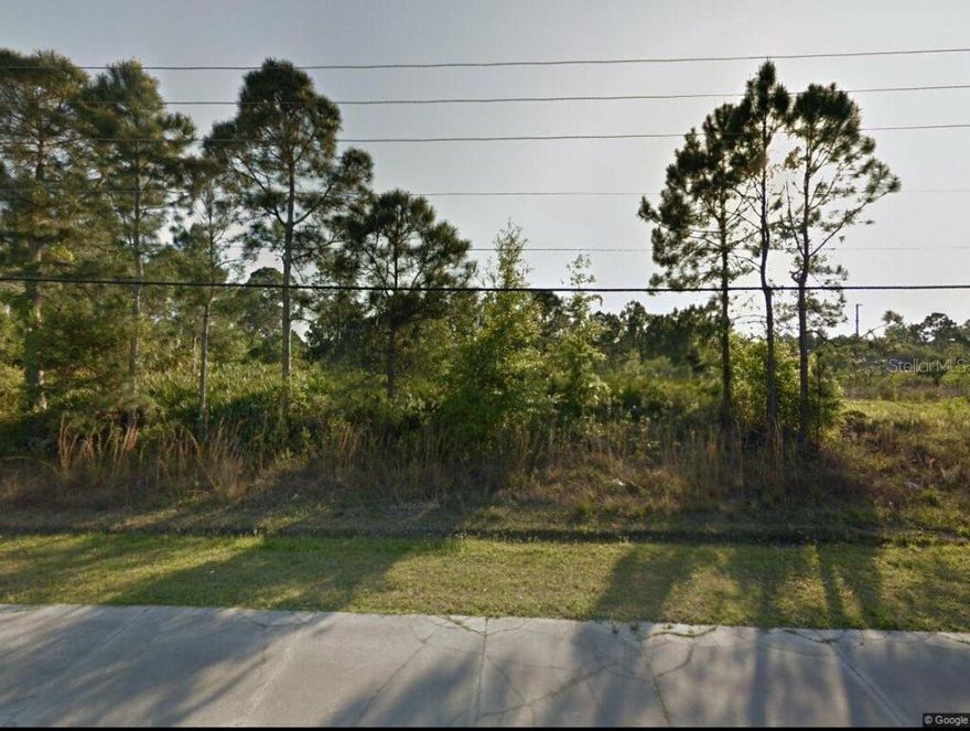 Port Malabar Vacant Residential Lot. Open Builder. .23 acre lot. Situated off quiet, low traffic Jupiter Blvd. Easy access to all store, restaurants and schools. Surrounded by new construction homes.