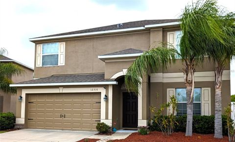 Photo of 12316 Streambed Drive, Riverview, FL 33579 (MLS # TB8430751)