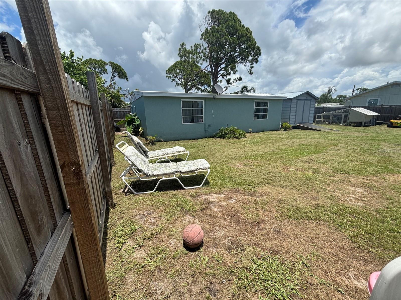 This Cozy rental home features 2 bedrooms and 1 bathroom, perfect for a relaxed coastal community lifestyle. Just a 6-minute drive away from Englewood Beach, this property features a charming, partially fenced front yard, currently serving as a garden. The property also has a completely fenced backyard for added seclusion and with a tankless water heater, you'll never run short of hot water. Additionally, the oversized driveway provides worry-free parking for RVs, boats, or work trailers.