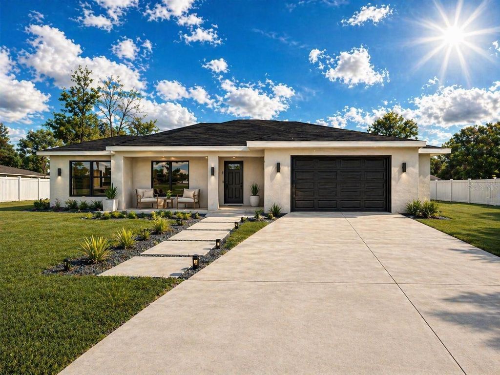 Photo of 11081 SW 107th Place, Dunnellon, FL 34432 (MLS # O6401442)