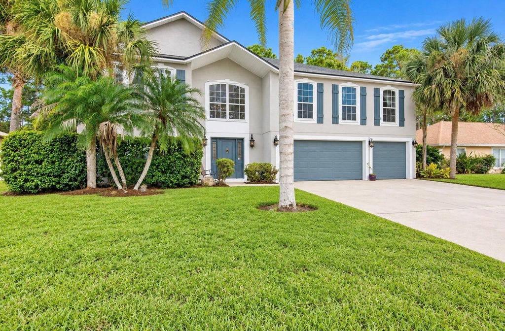 Photo of 75 Putter Drive, Palm Coast, FL 32164 (MLS # FC322320)