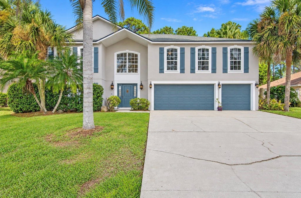 Photo of 75 Putter Drive, Palm Coast, FL 32164 (MLS # FC322320)