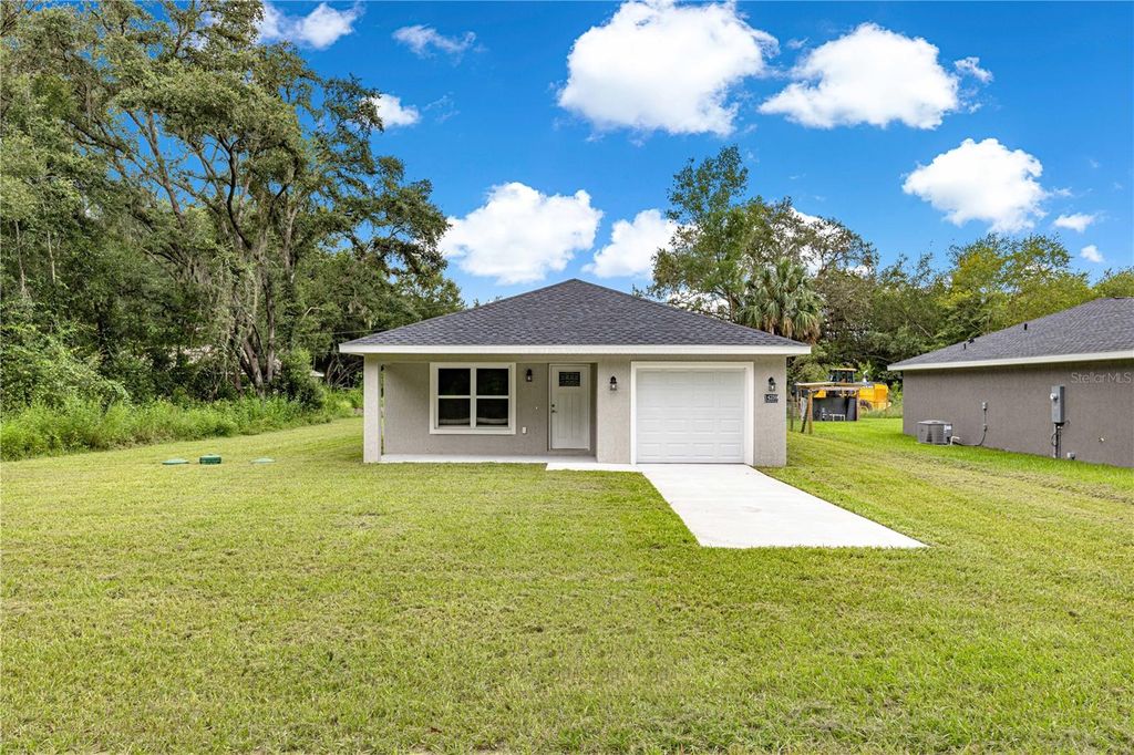 Photo of 14259 SE 33rd Terrace, Summerfield, FL 34491 (MLS # OM708742)