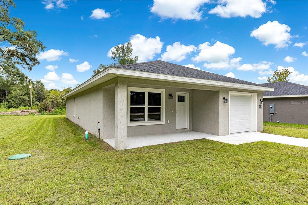 Photo of 14259 SE 33rd Terrace, Summerfield, FL 34491 (MLS # OM708742)