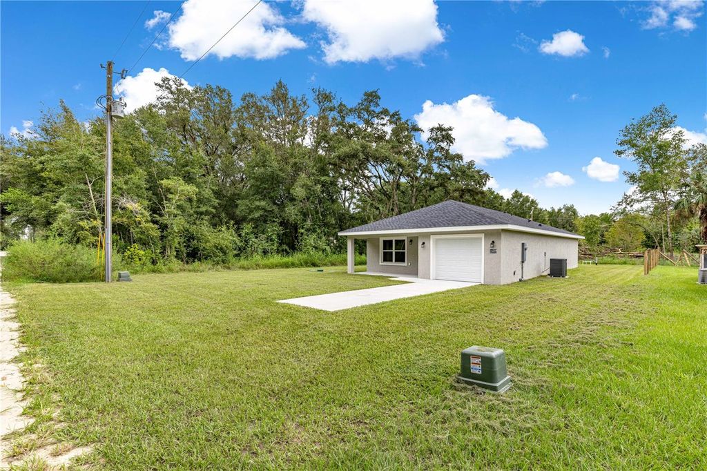 Photo of 14259 SE 33rd Terrace, Summerfield, FL 34491 (MLS # OM708742)