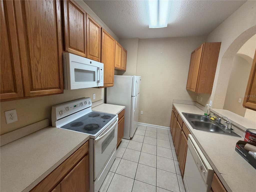 Photo of 6335 Contessa Drive #204, Orlando, FL 32829 (MLS # O6423811)
