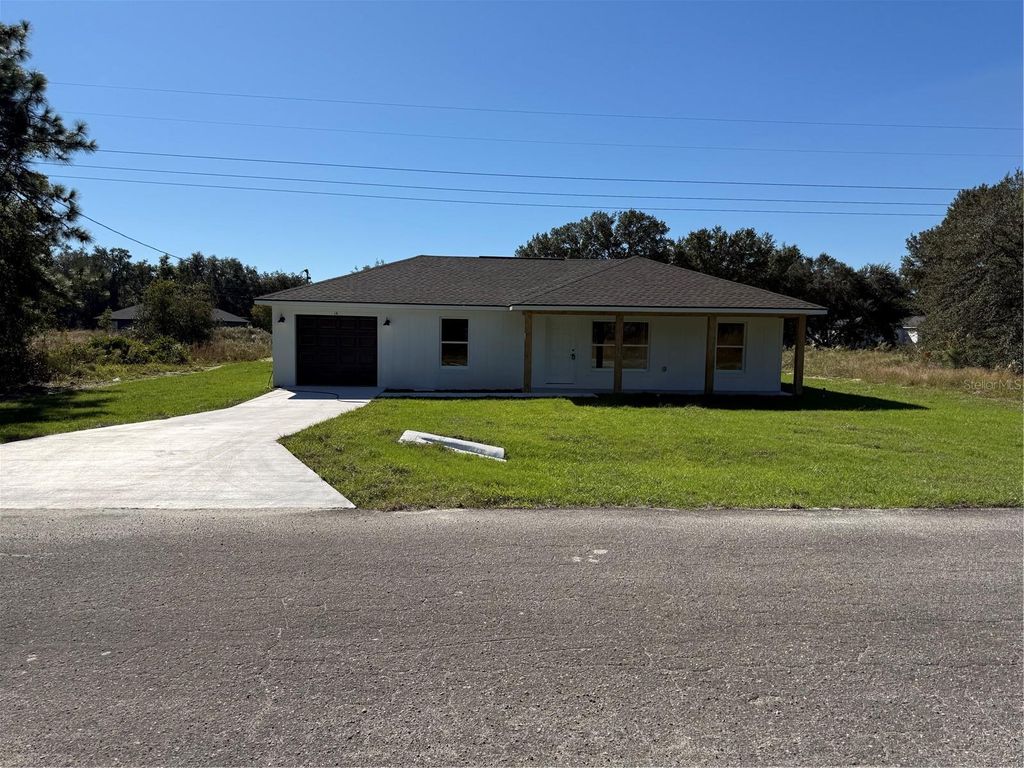 Photo of 14 Guava Trak, Ocklawaha, FL 32179 (MLS # OM711403)