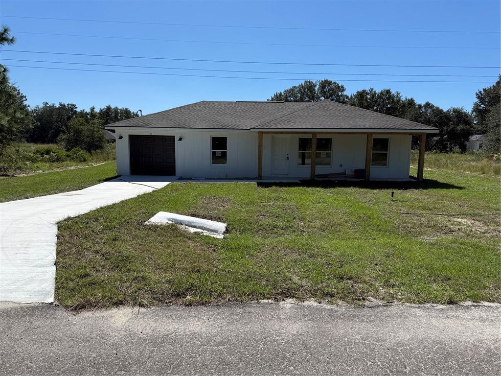 Photo of 14 Guva Trak, Ocklawaha, FL 32179 (MLS # OM711403)