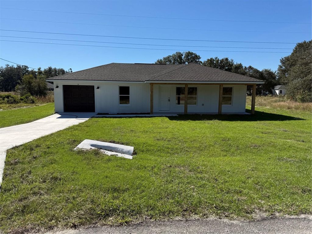 Photo of 14 Guava Trak, Ocklawaha, FL 32179 (MLS # OM711403)