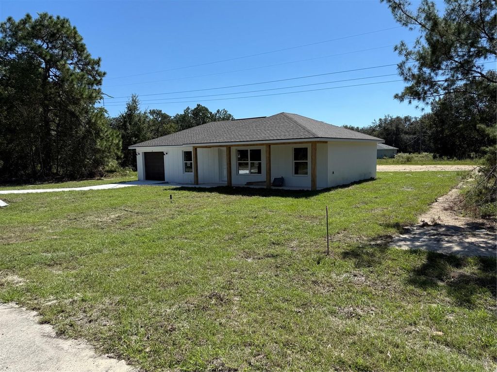 Photo of 14 Guva Trak, Ocklawaha, FL 32179 (MLS # OM711403)