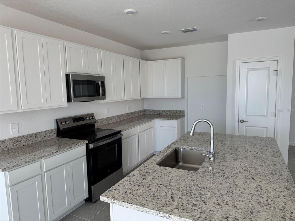 Photo of 9026 Optimist Way, Palmetto, FL 34221 (MLS # A4675504)