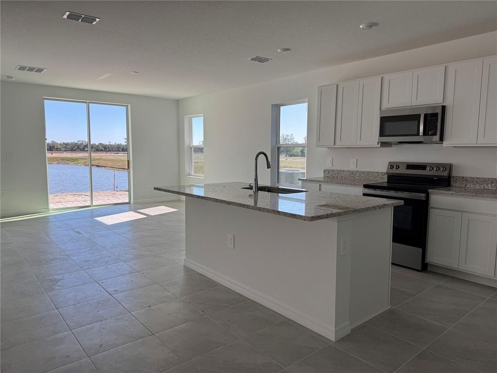 Photo of 9026 Optimist Way, Palmetto, FL 34221 (MLS # A4675504)